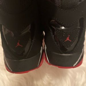 Jordan’s girl or boy. Red and black. Size 1.